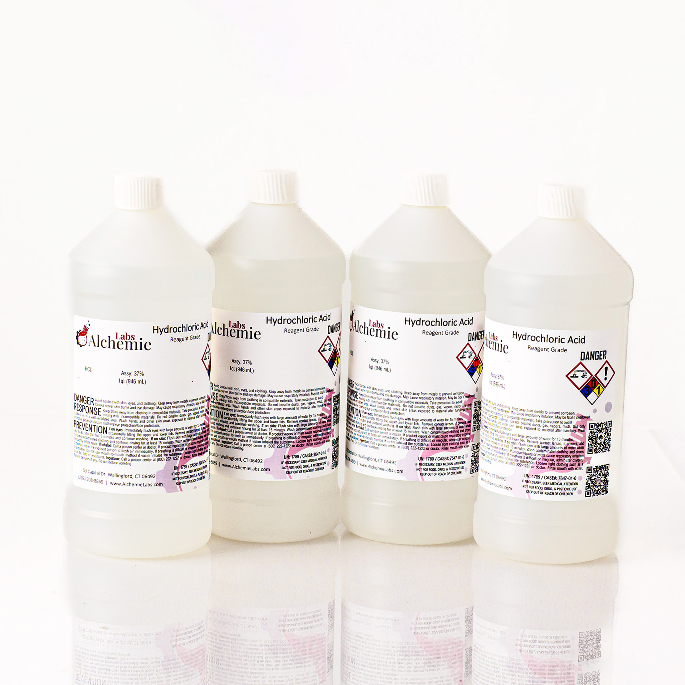 Four 1-quart plastic bottles of Alchemie Labs hydrochloric acid, reagent grade, totaling 1 gallon, with safety labels.