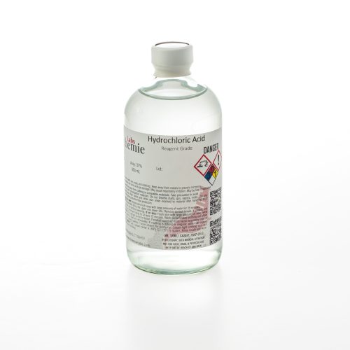 A 480mL clear glass bottle of Alchemie Labs hydrochloric acid, reagent grade, with a detailed label including safety instructions.