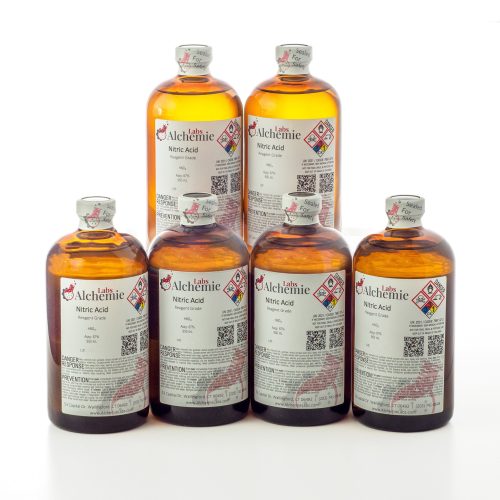 Six amber 950mL bottles of Alchemie Labs nitric acid with reagent grade quality and safety seals on a white background.